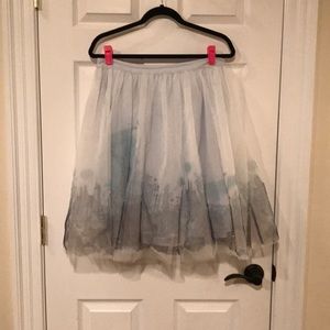 Light blue tool skirt with designs on the bottom